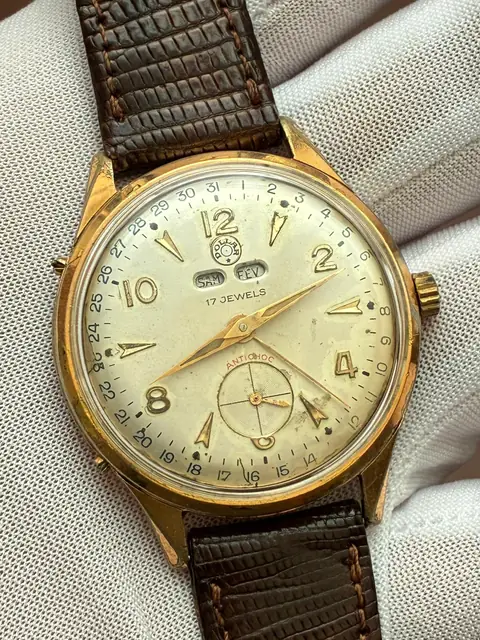 Reloj Corona vintage de cuerda con triple calendario