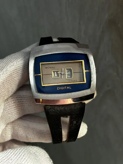 Reloj horas saltantes años 70