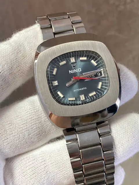 Reloj suizo Nino automático antiguo stock armis original