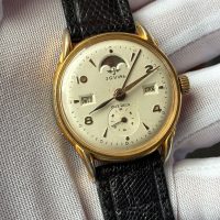 Reloj jovial triple calendario con fase lunar