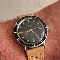 Reloj diver esfera negra preciosa patina